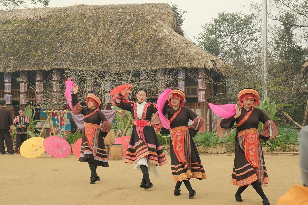 A traditional dance performance in a Sapa village