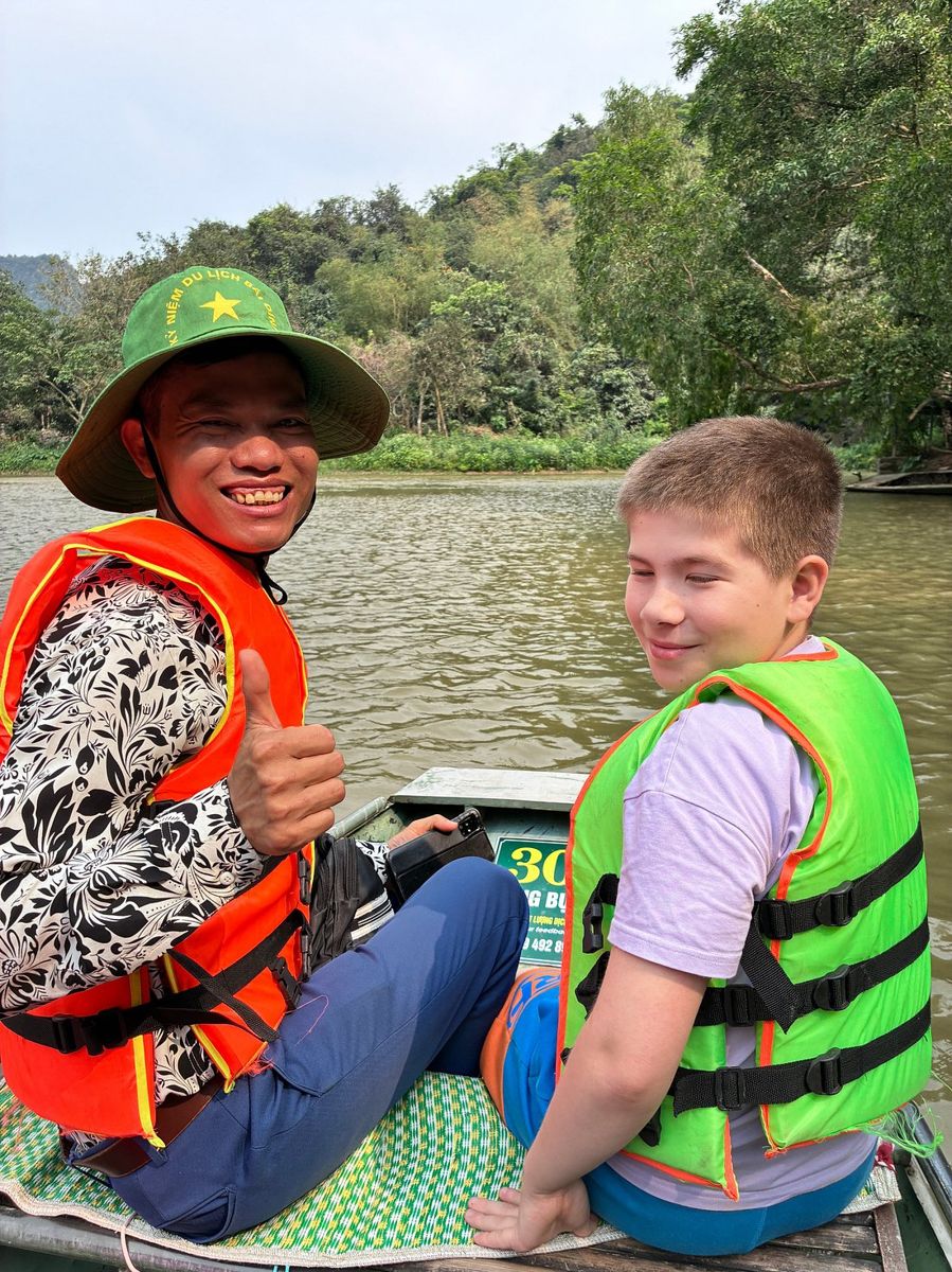 Our guide and son on a Ninh Binh boat trip