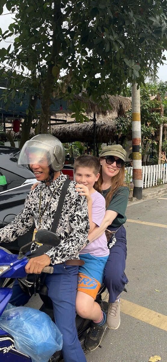 Riding through the streets with our guide