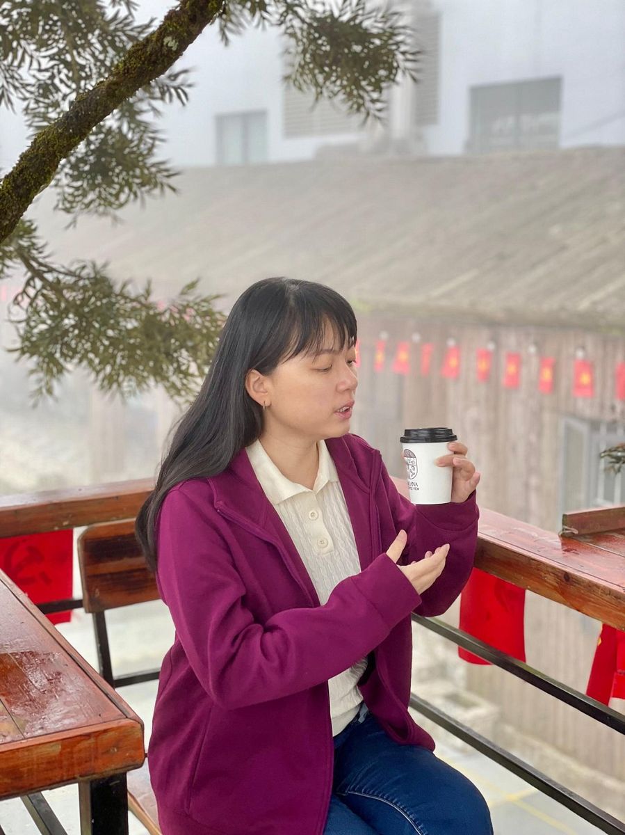 Coffee with a misty mountain view in Sapa